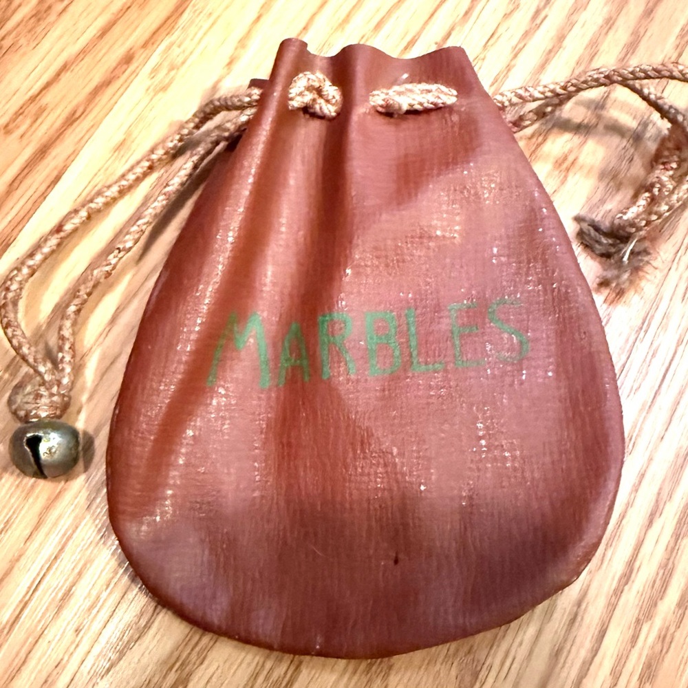 Vintage leather drawstring pouch for marbles, with bell